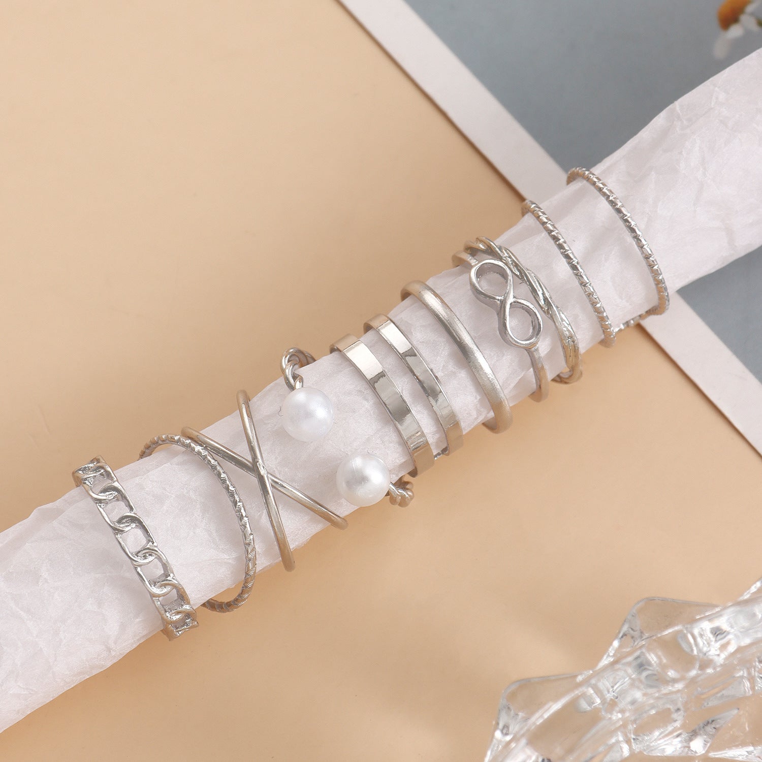 Wholesale Hollowed Out Geometric Wave Shaped Pearl Opening 9-piece Set of Rings